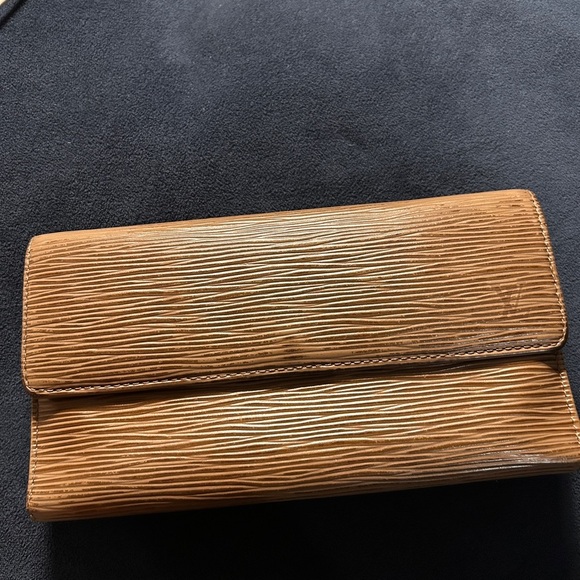 Louis Vuitton Handbags - 162. Louis Vuitton tan Epi trifold wallet (project)